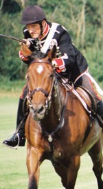 Taking aim with the lance, in a Skill at Arms Display